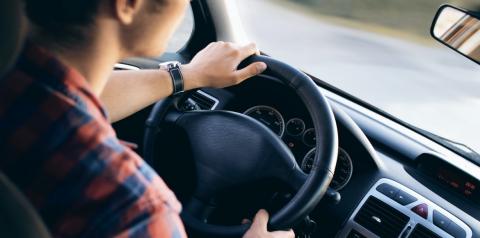 person behind the wheel
