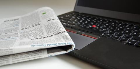 newspaper & computer
